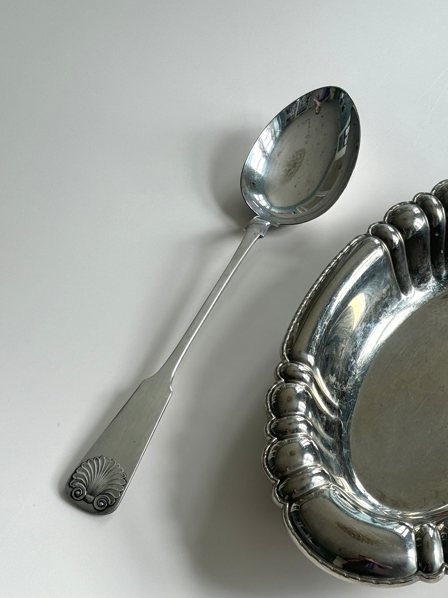 Silver pleated serving spoon