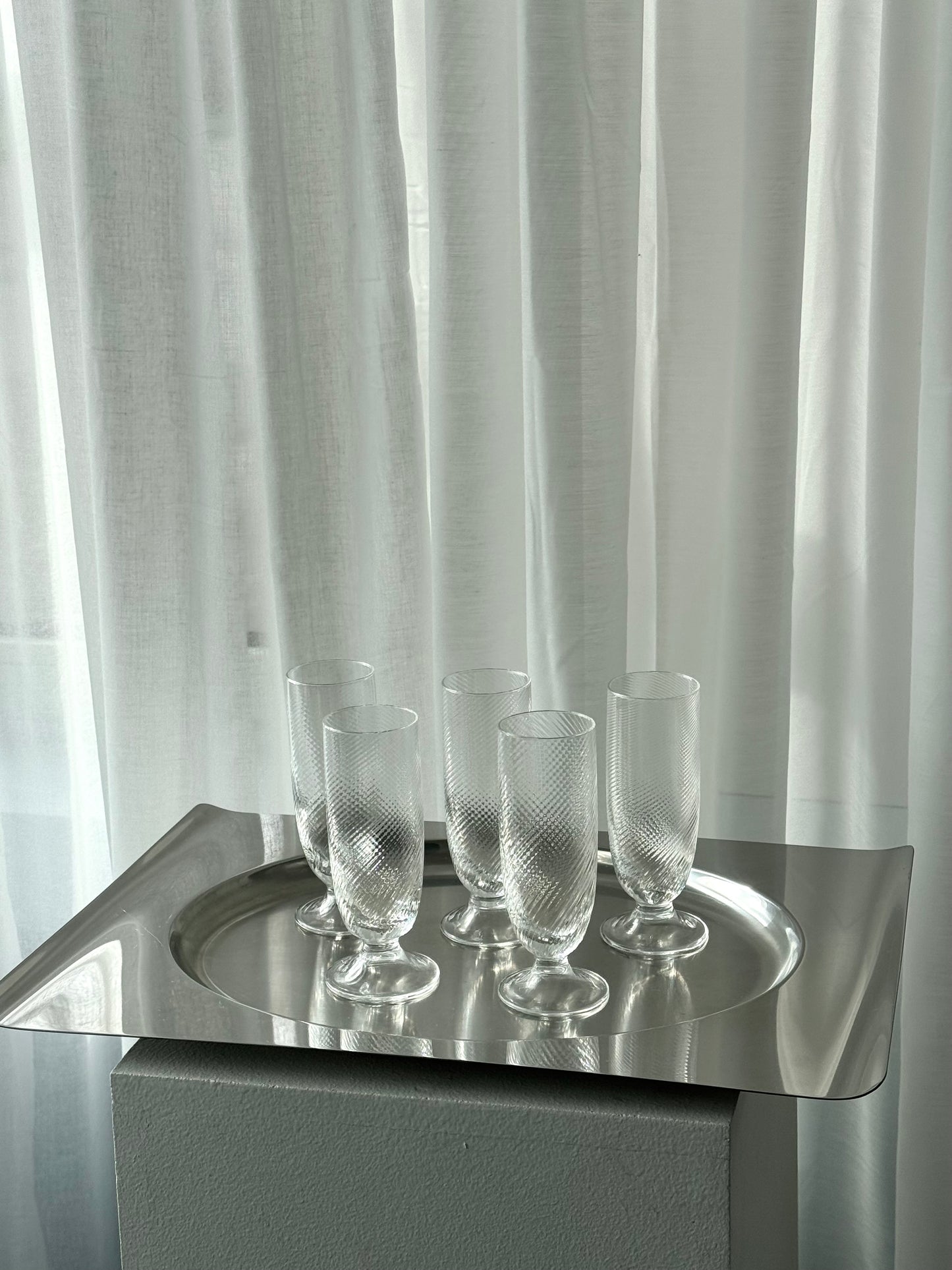 Swirling tall glasses