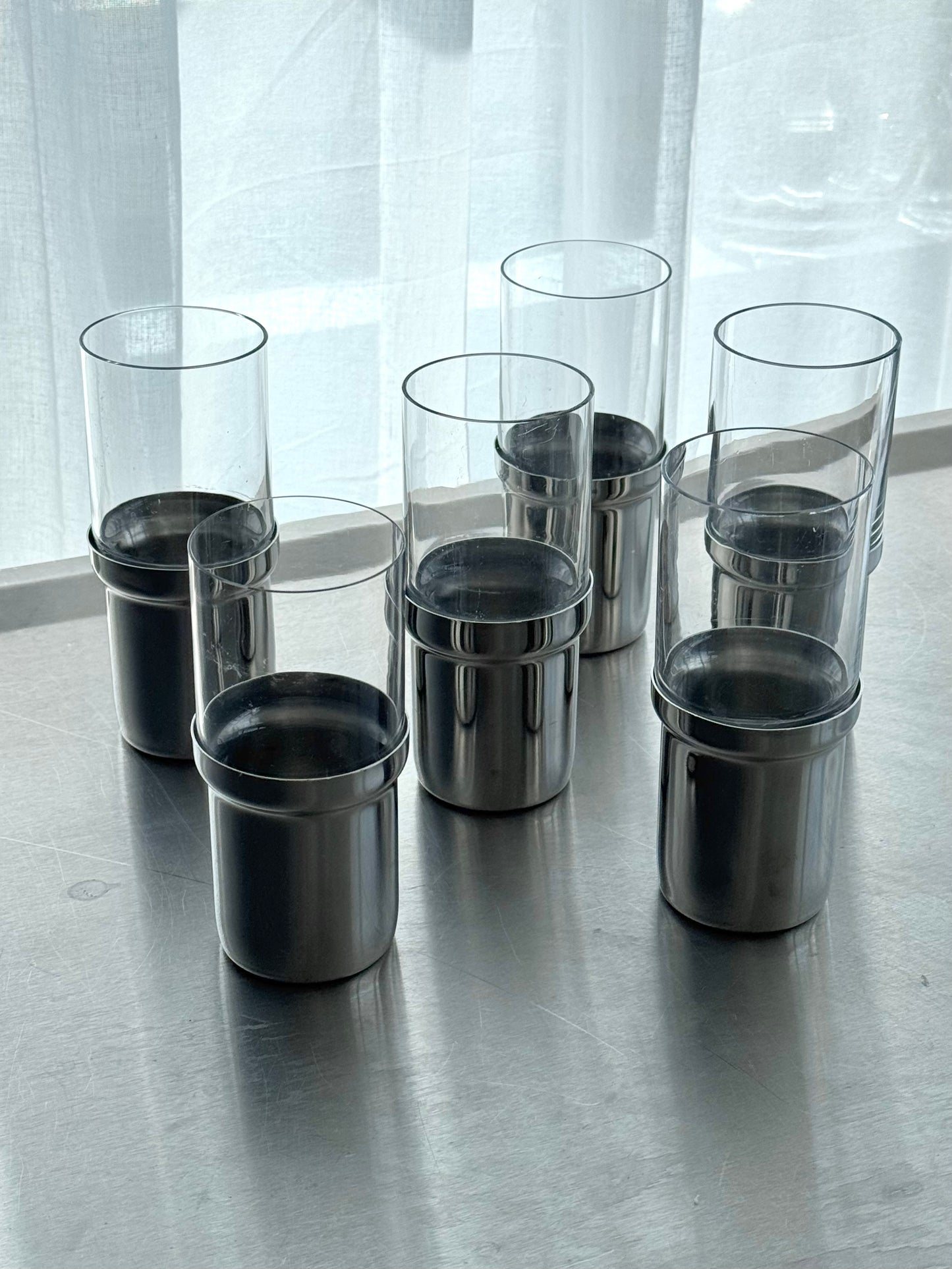 Tall chrome glasses