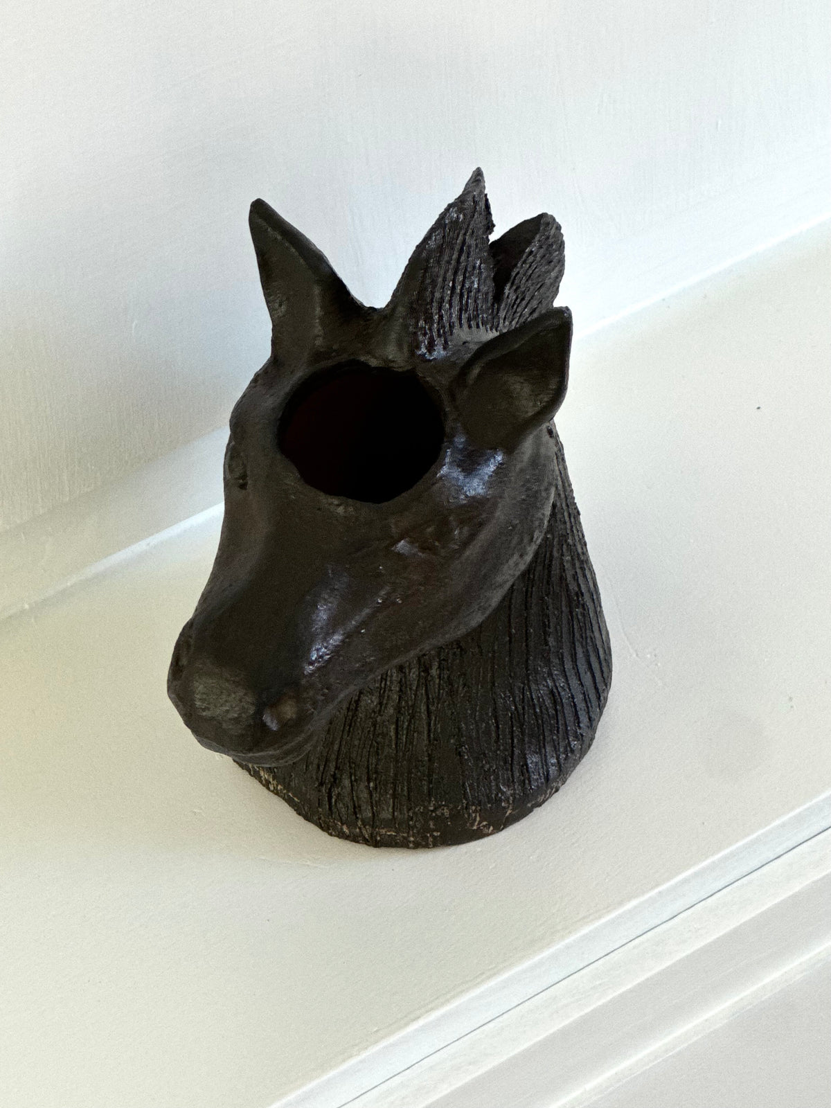 Horse head vase