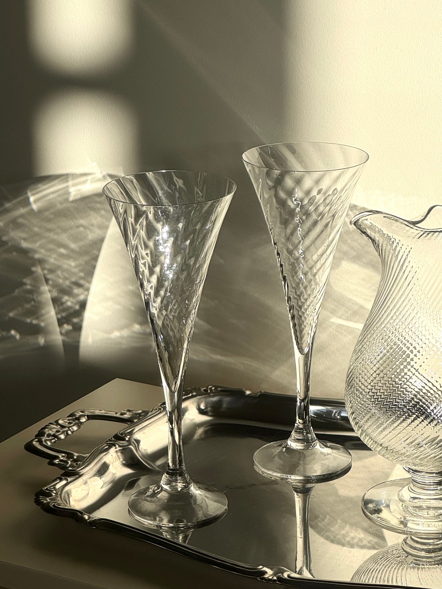 Swirling champagne glasses