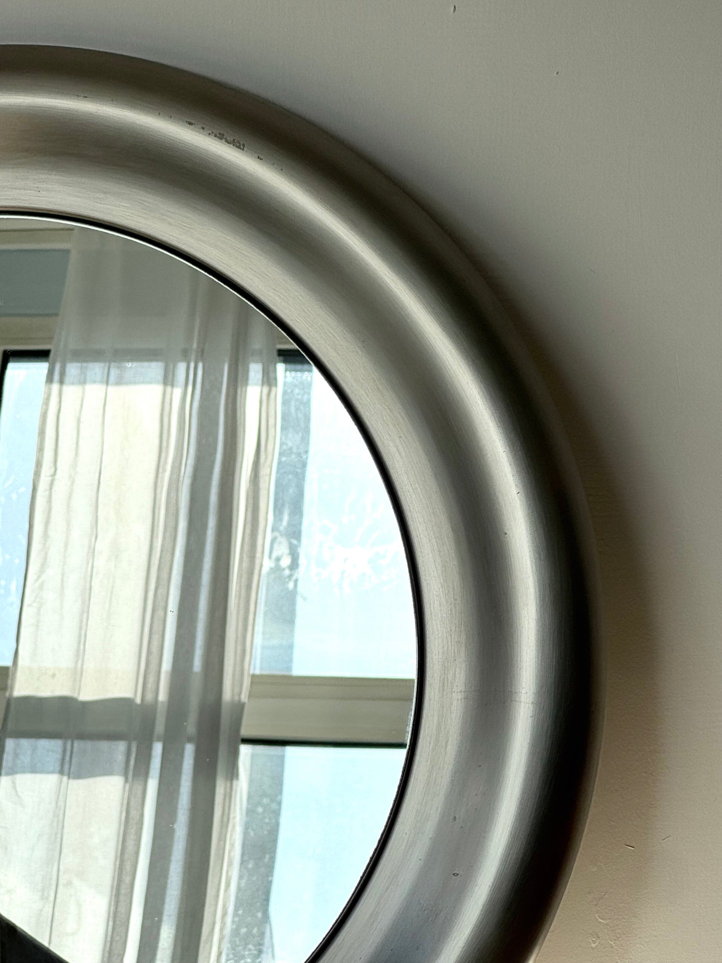Steel mirror