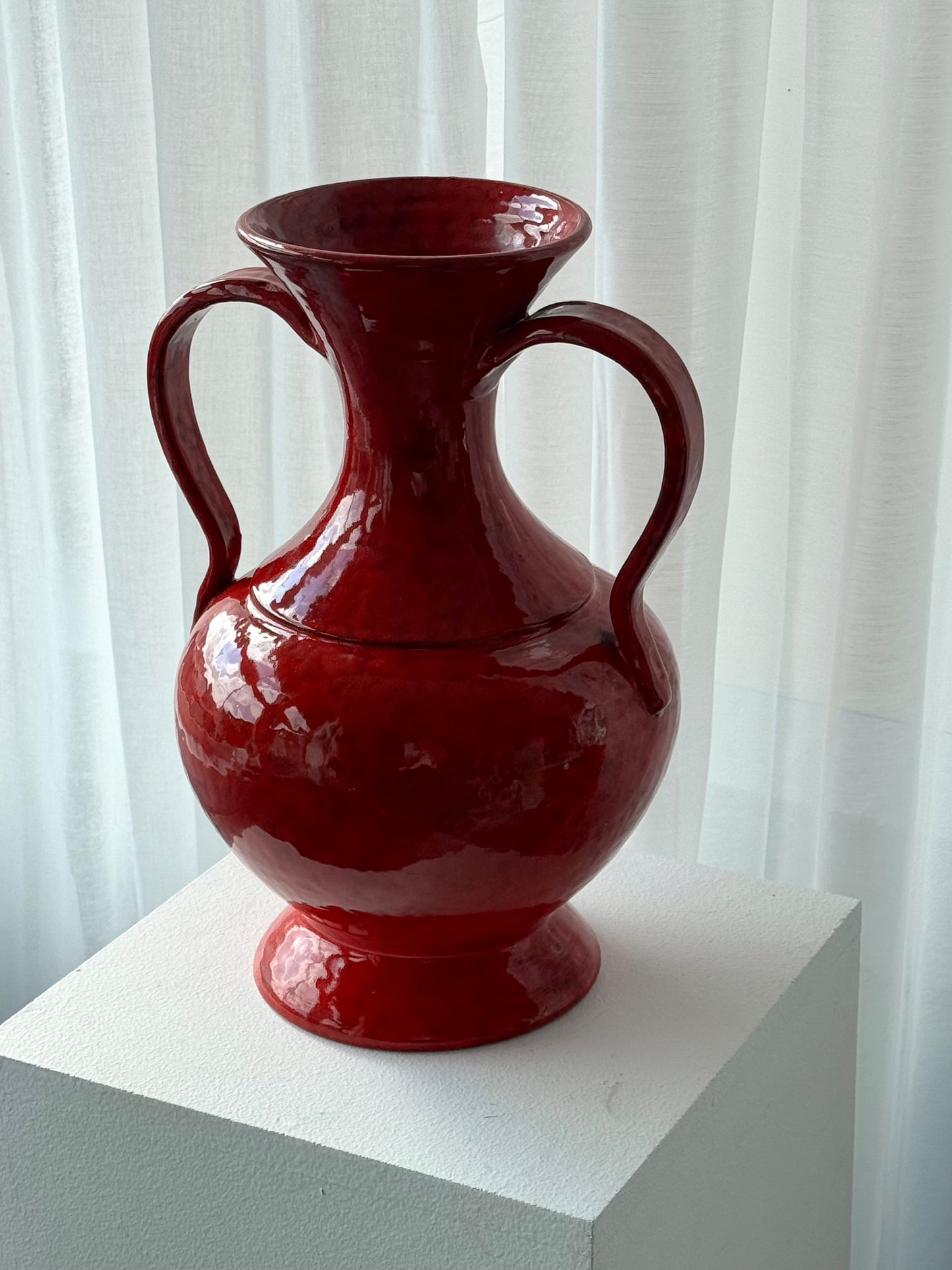 Red ceramic vase