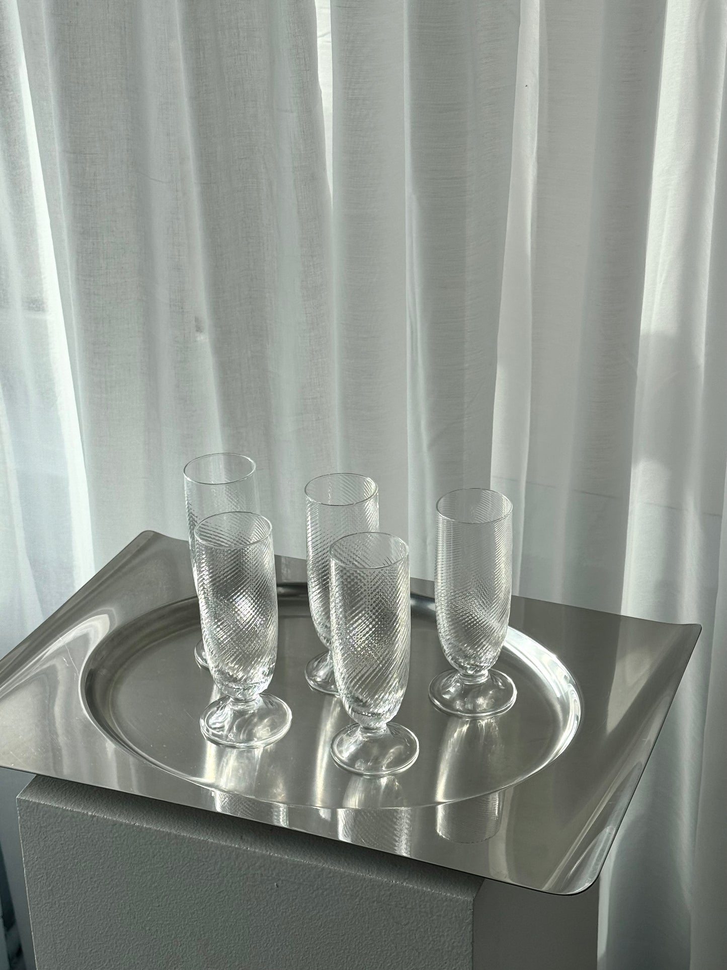 Swirling tall glasses