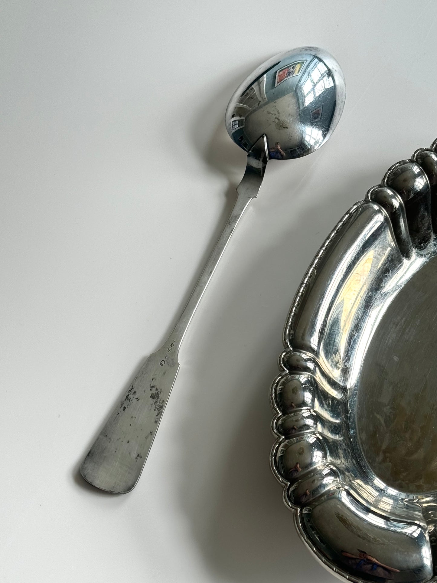Silver pleated serving spoon
