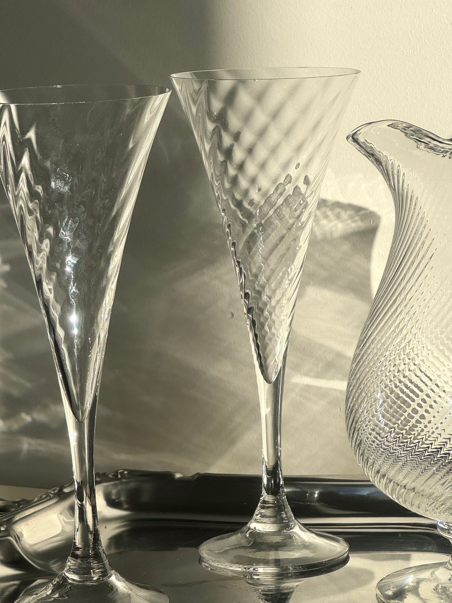 Swirling champagne glasses