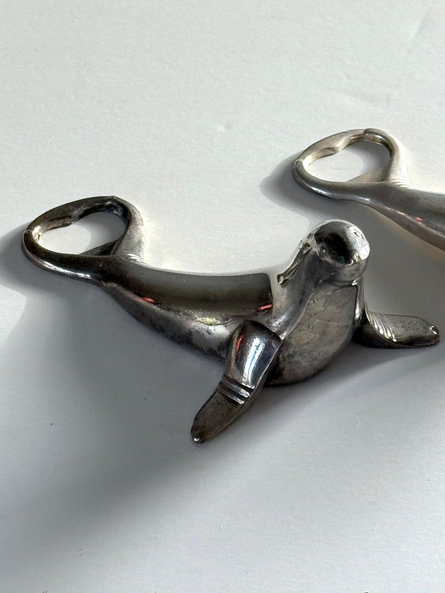 Seal bottle opener