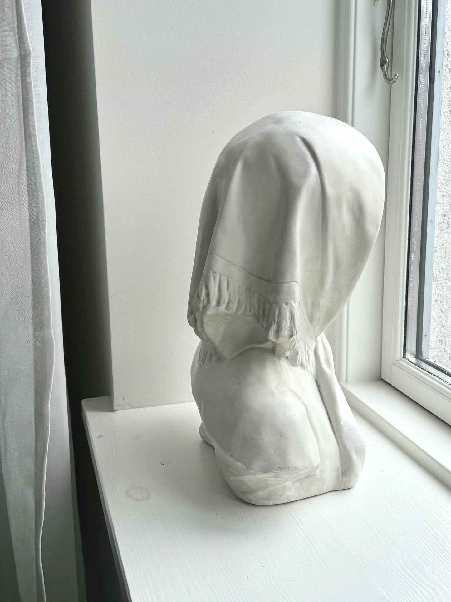 Plaster bust young lady