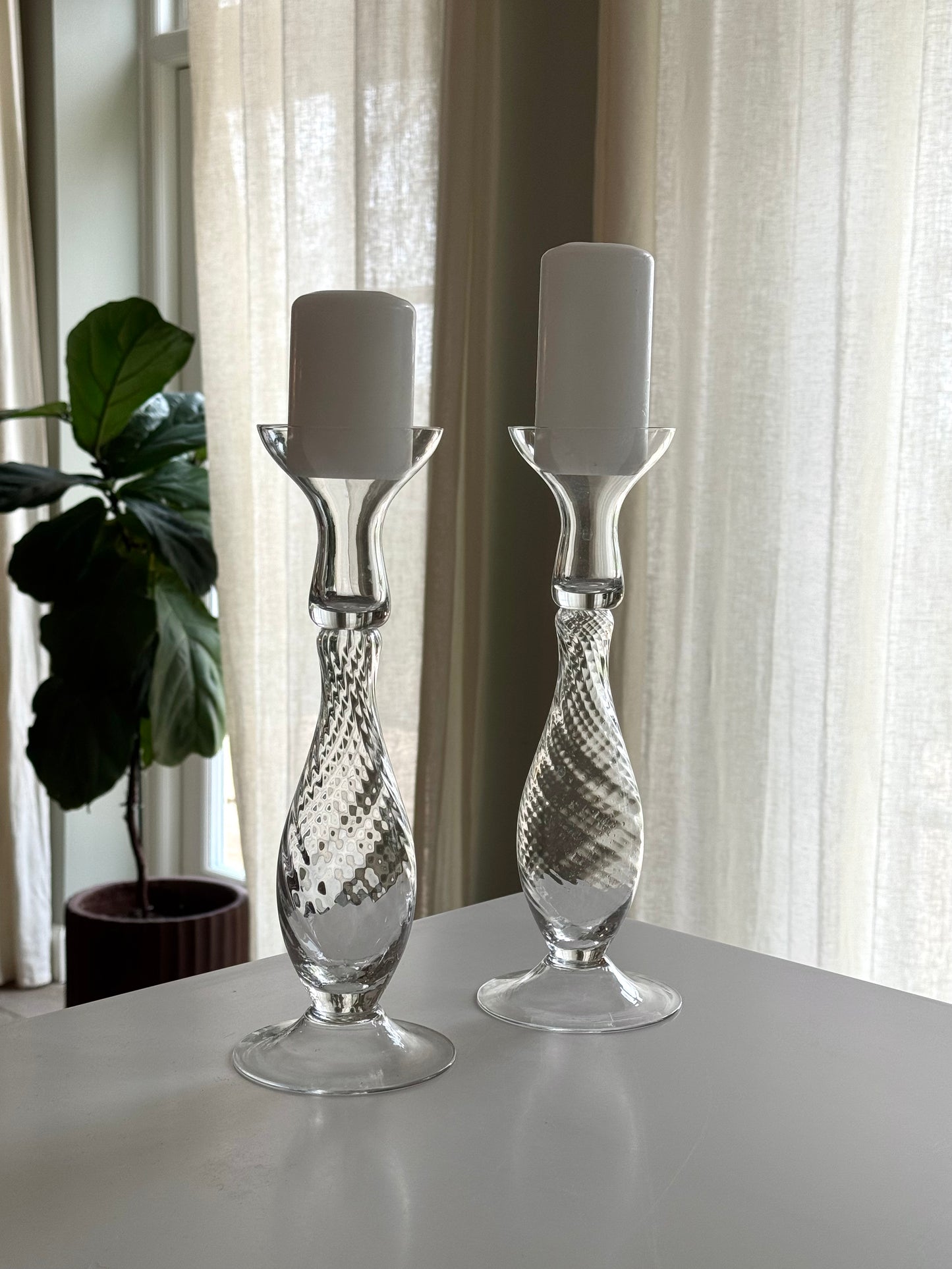 Swirling candleholders