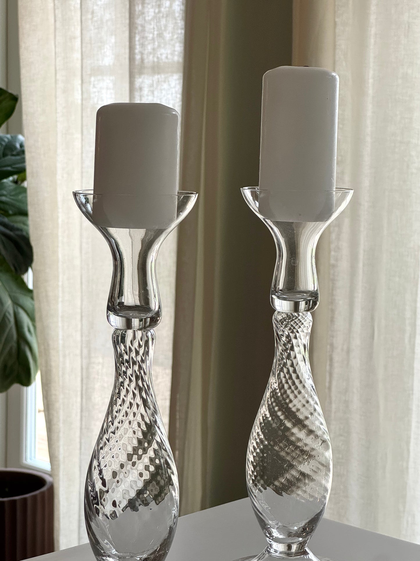 Swirling candleholders