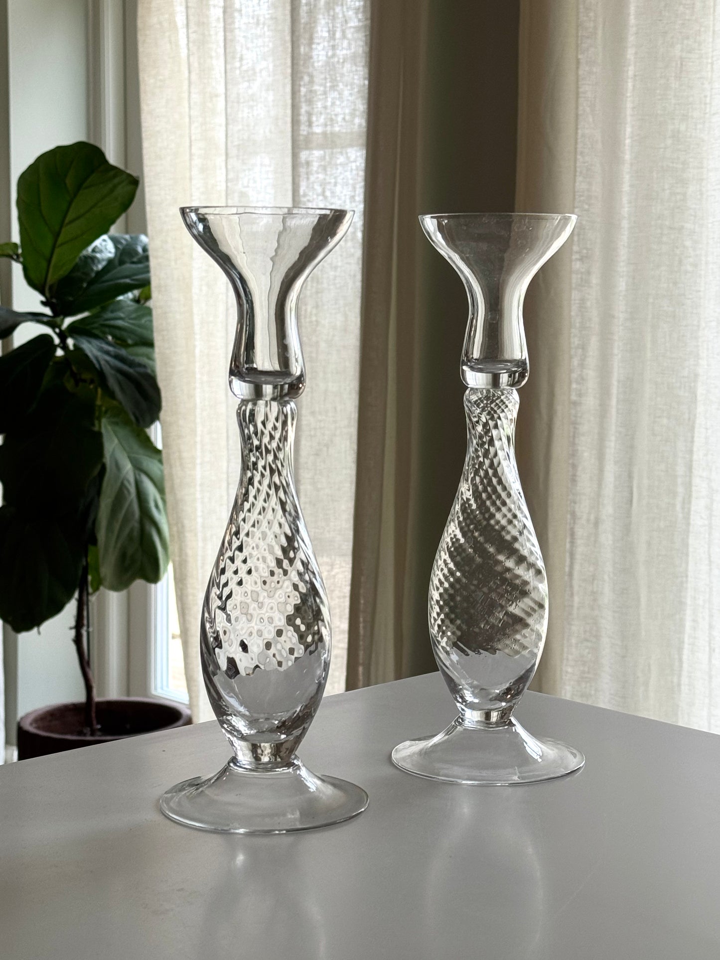Swirling candleholders