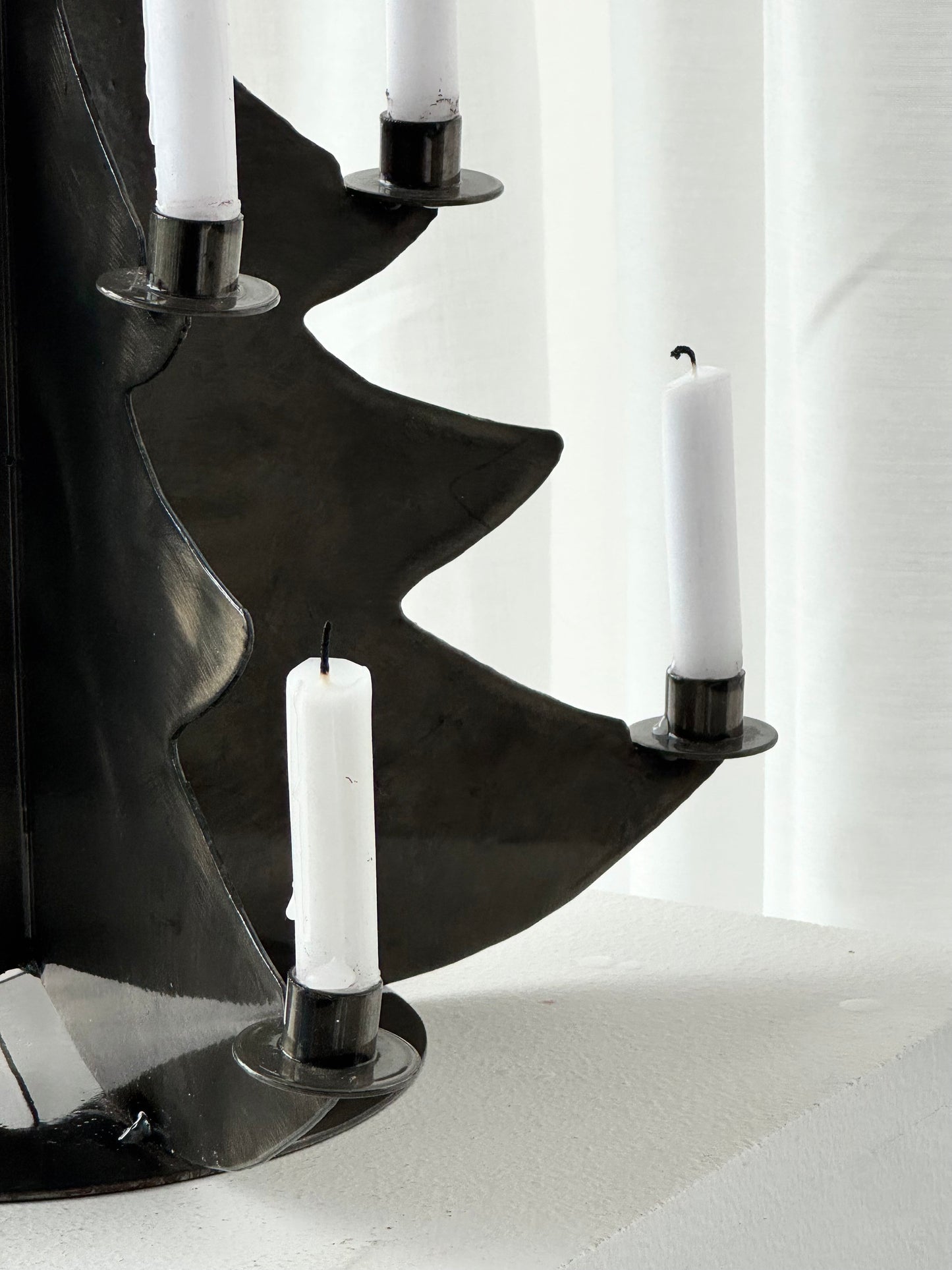 Handmade metal three