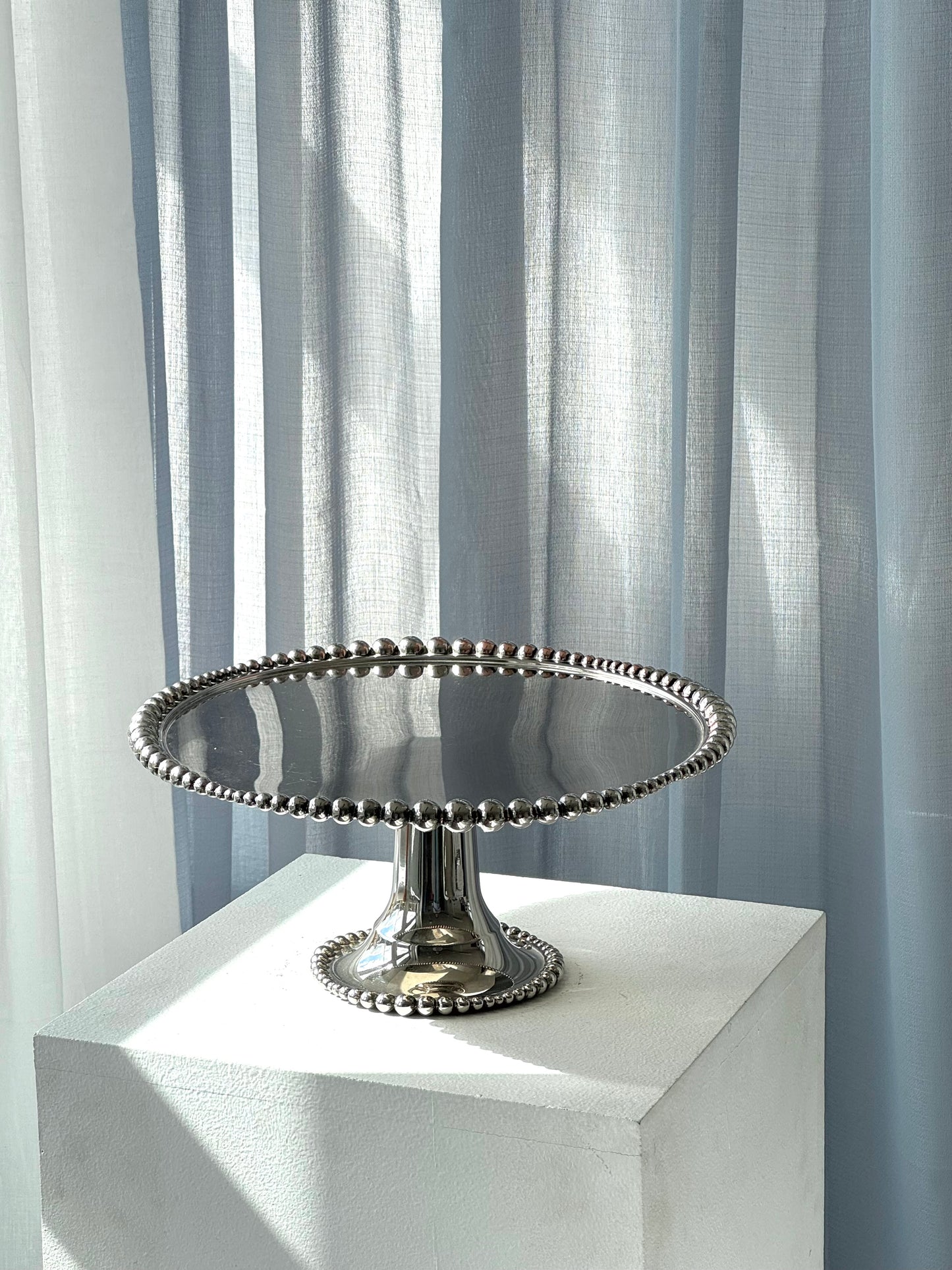Silver plated stand