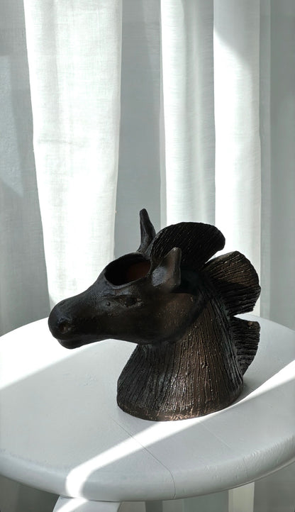 Horse head vase