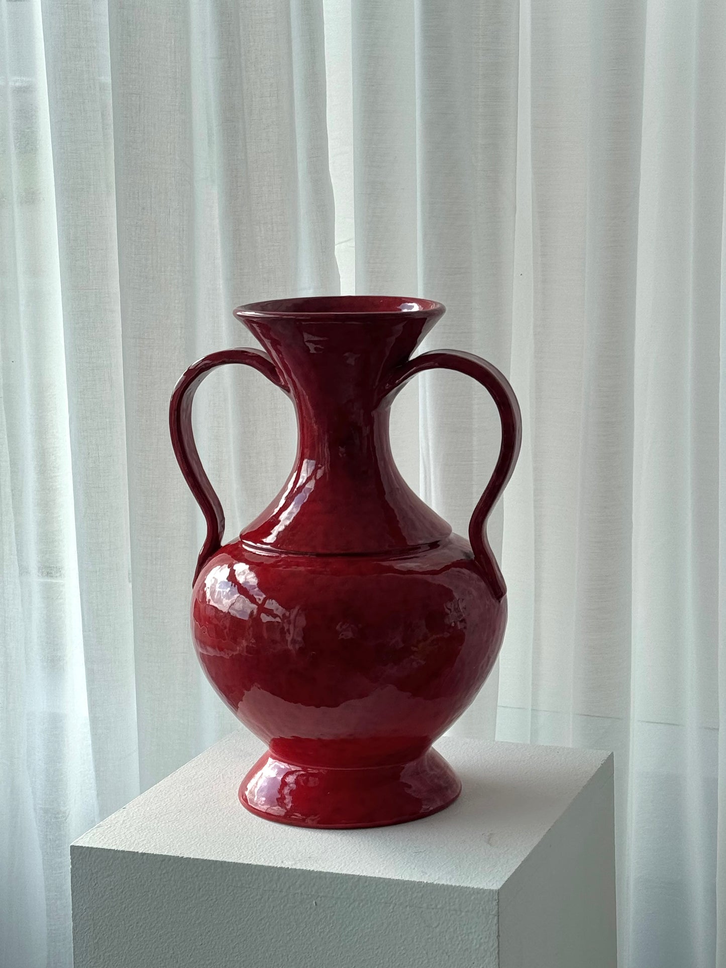 Red ceramic vase