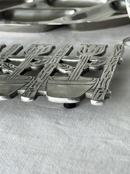 Alu trivet