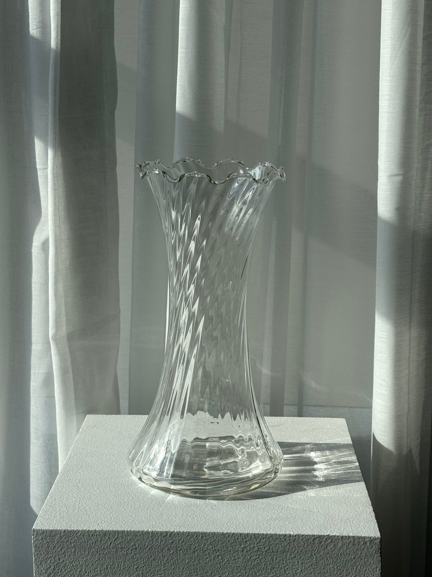 Tall swirling vase