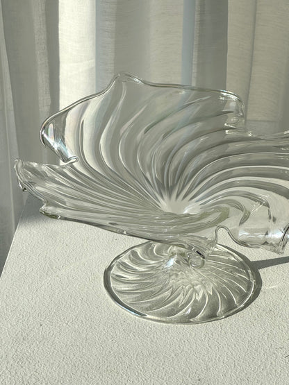 Swirling glass stand