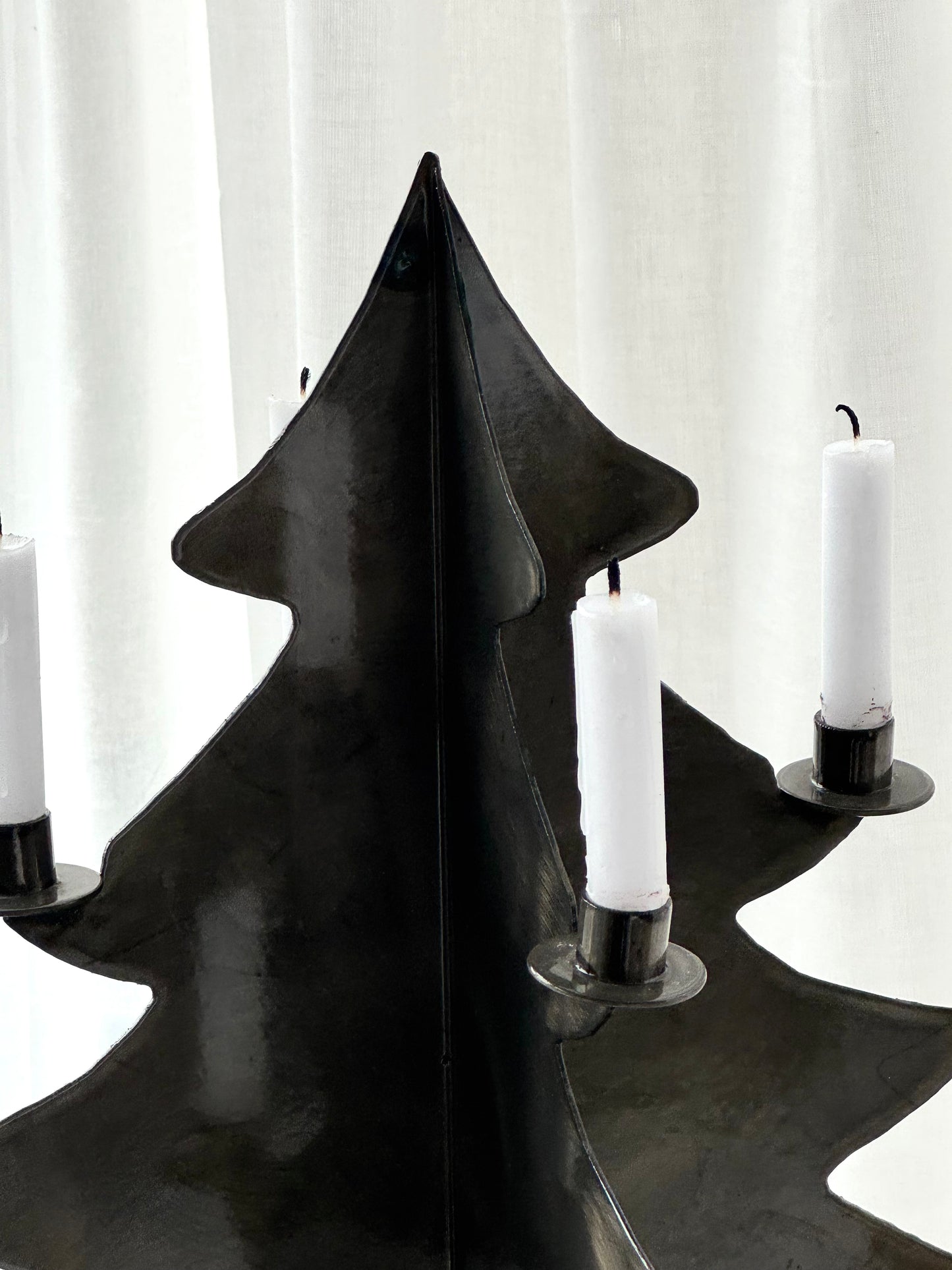 Handmade metal three