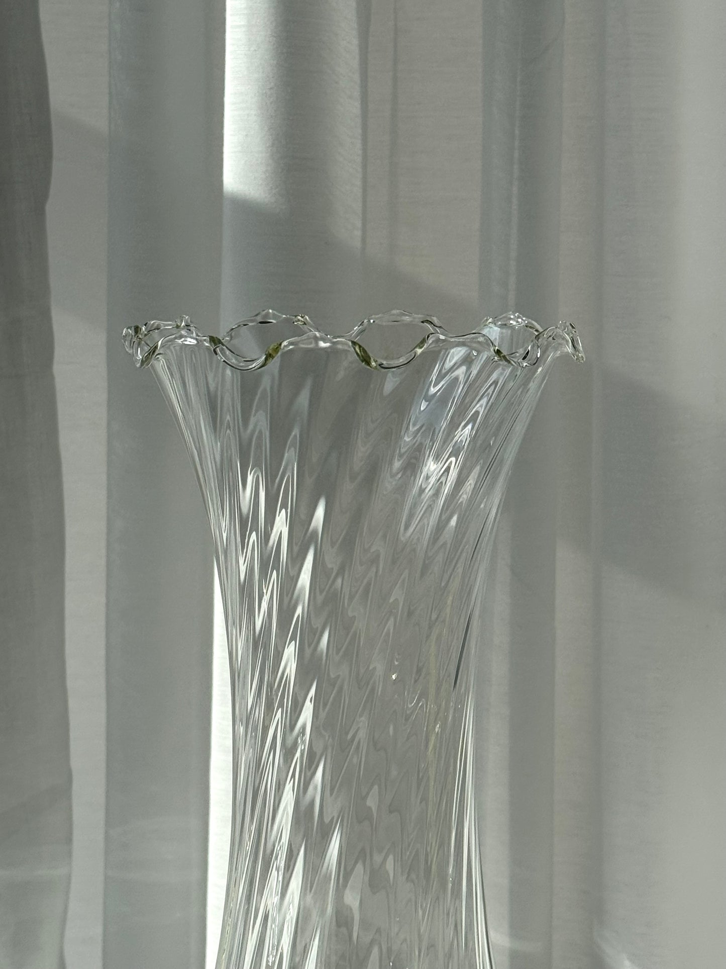 Tall swirling vase