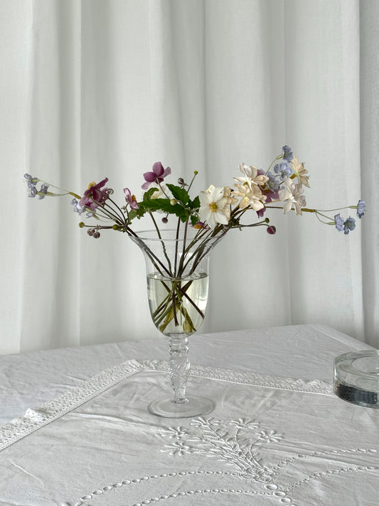 Tall swirling vase