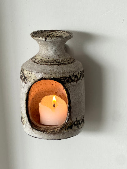 Wall hung candleholder