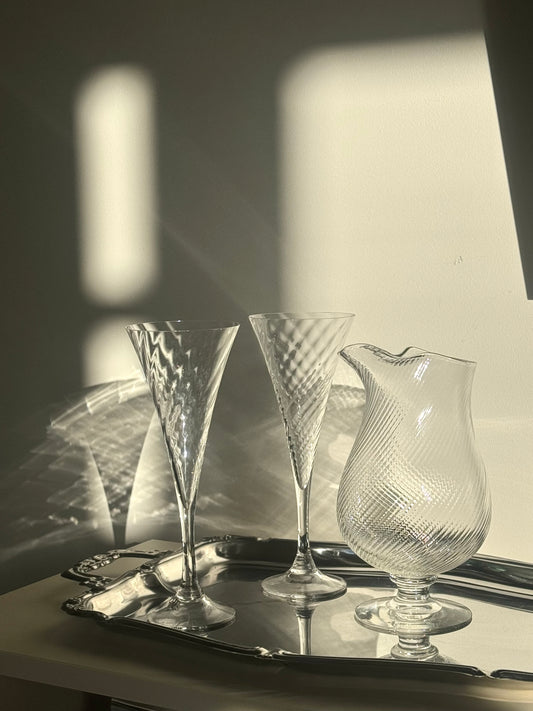 Swirling champagne glasses