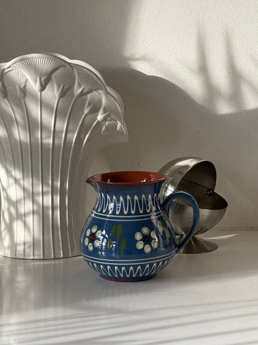 Blue ceramic pitcher