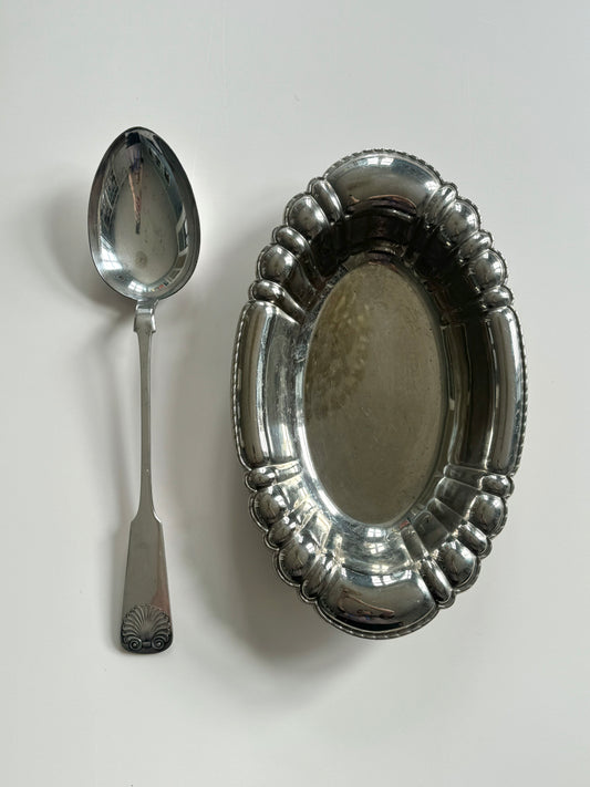 Silver pleated serving spoon