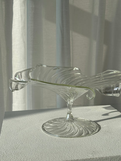 Swirling glass stand