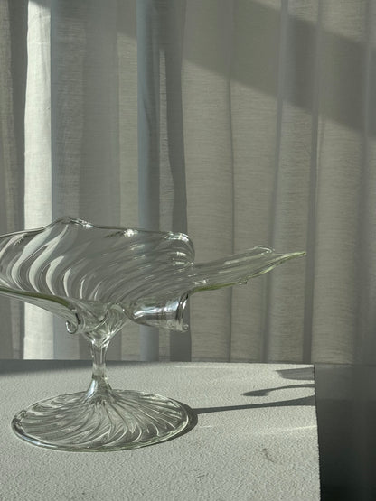 Swirling glass stand