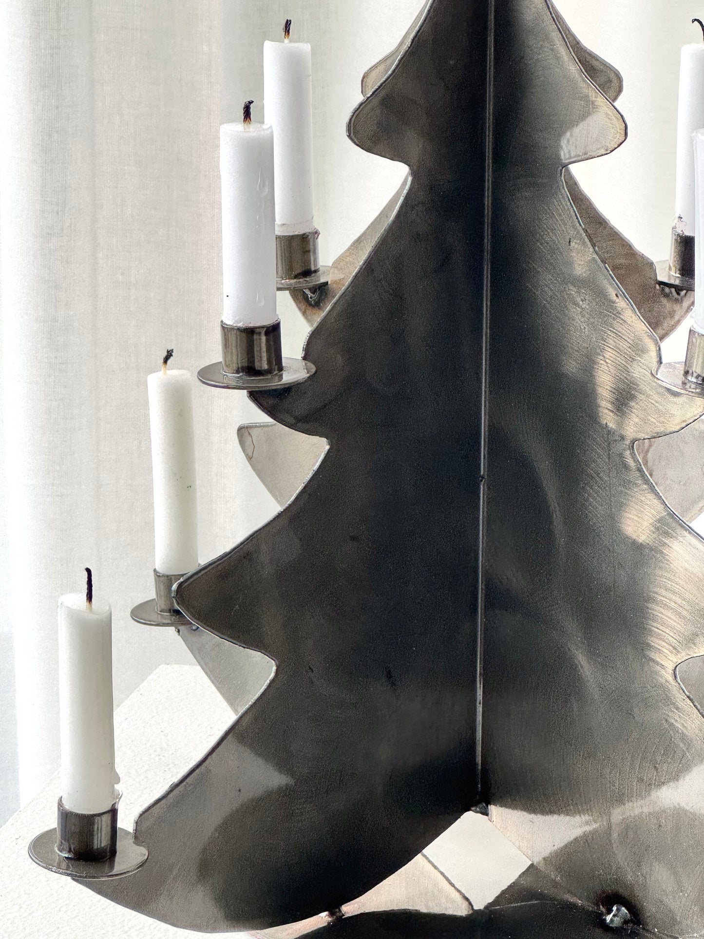 Handmade metal three