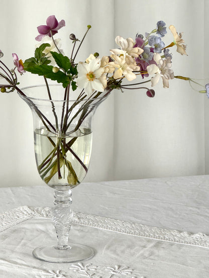 Tall swirling vase