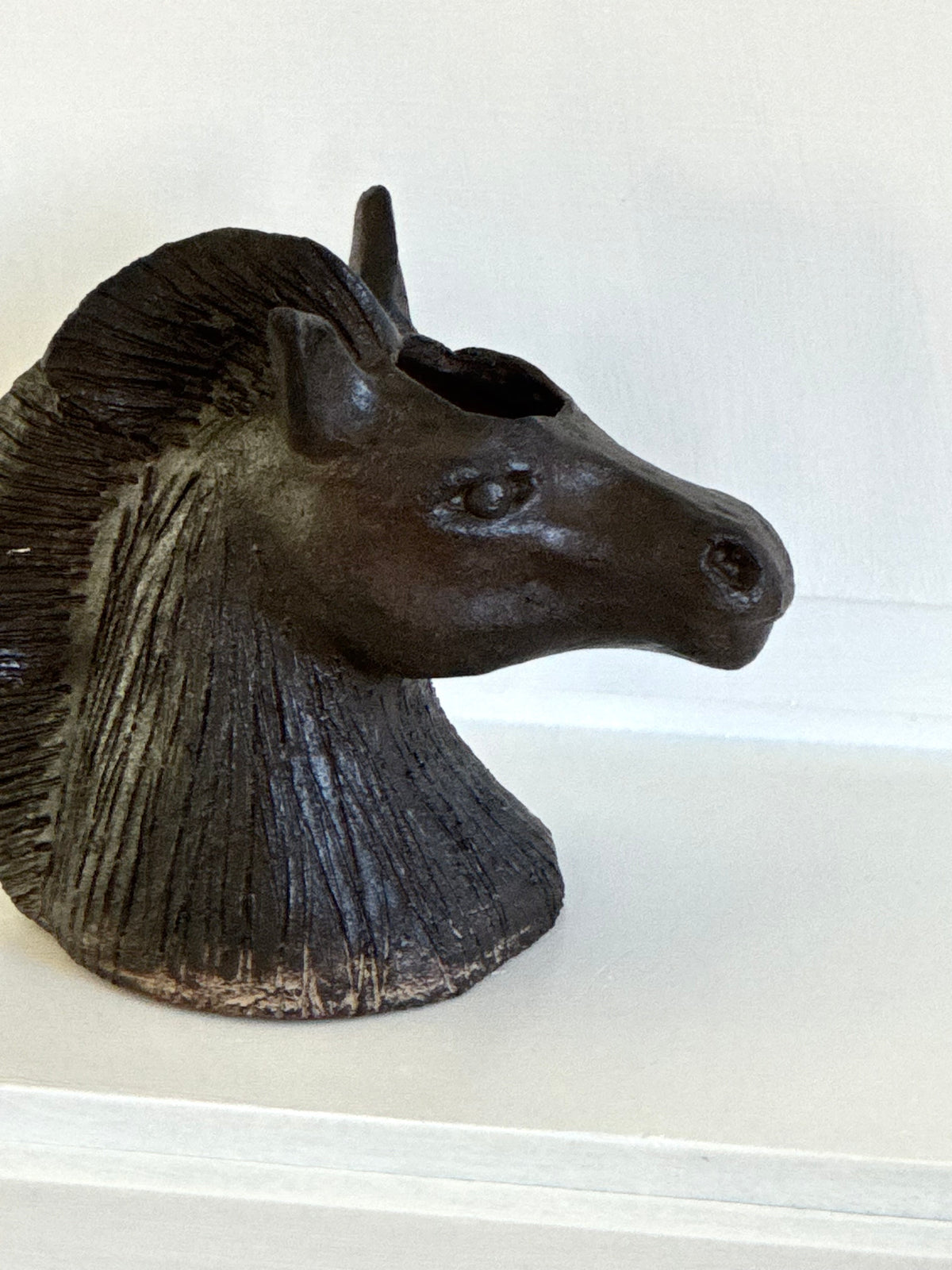 Horse head vase