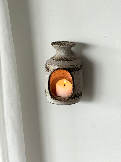 Wall hung candleholder