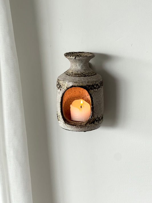 Wall hung candleholder