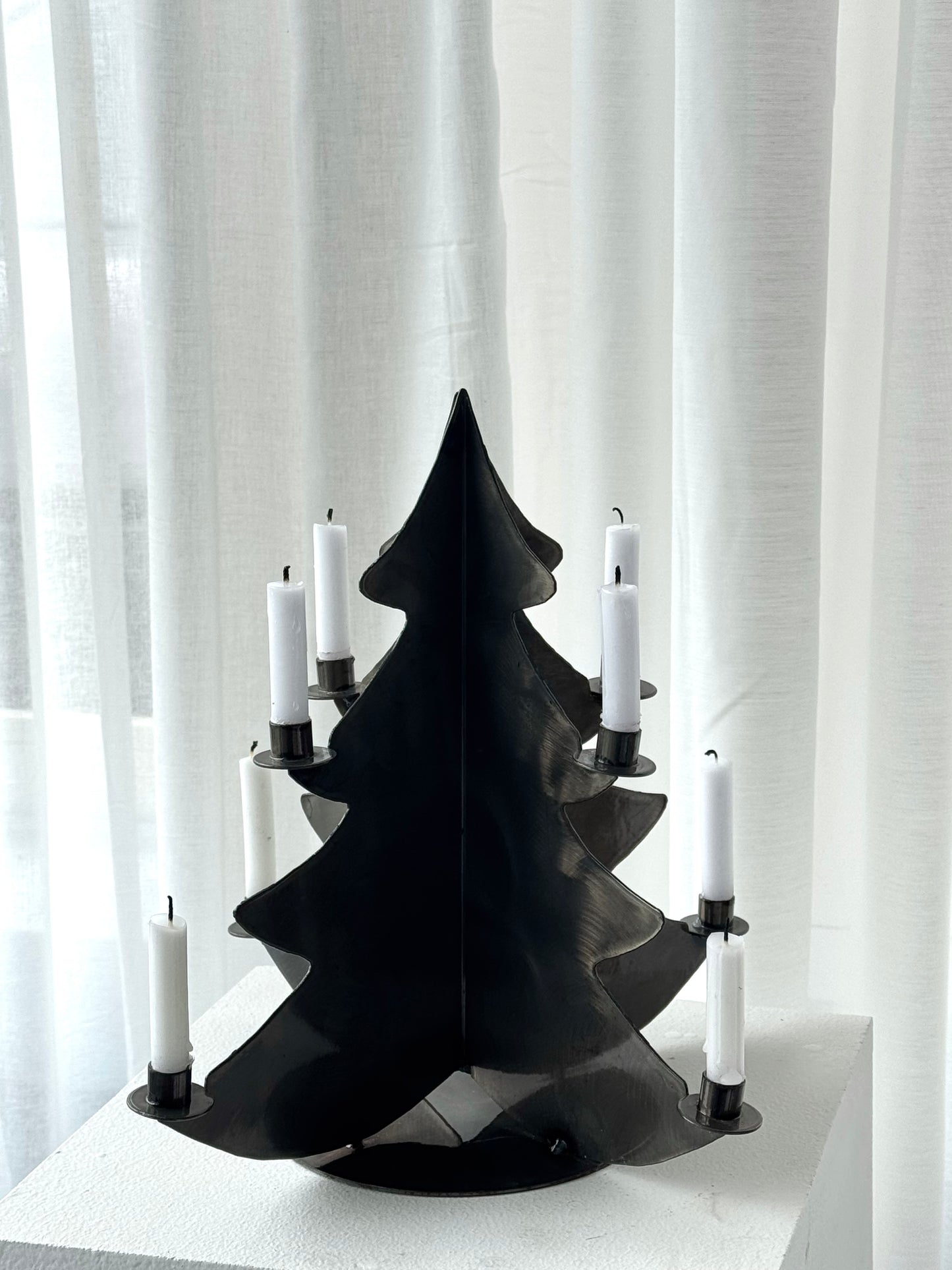 Handmade metal three