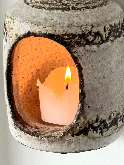 Wall hung candleholder