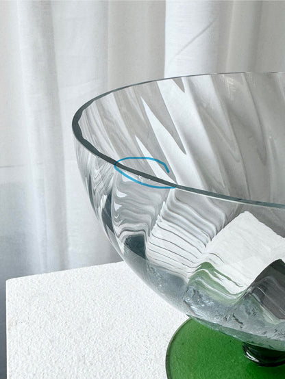 Swirling bowl on foot