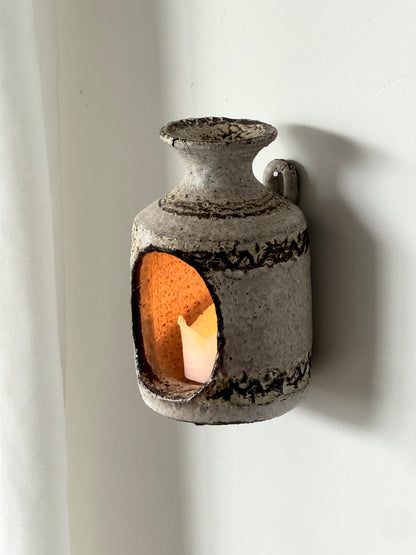 Wall hung candleholder