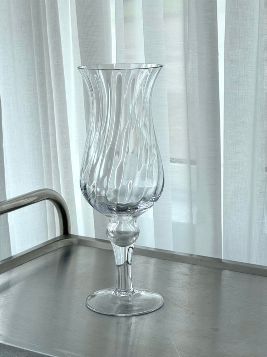 Swirling vase on foot