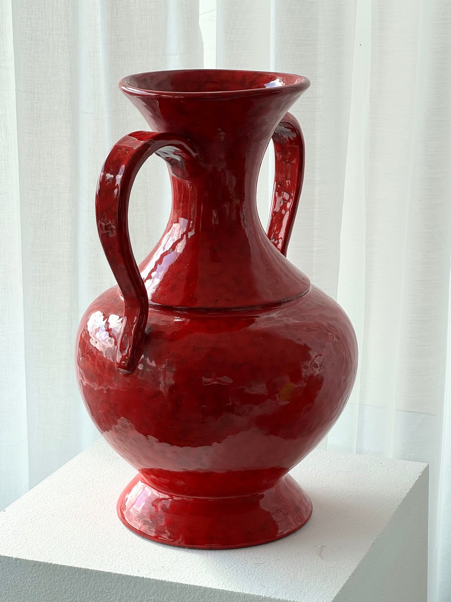 Red ceramic vase