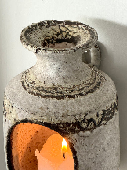 Wall hung candleholder