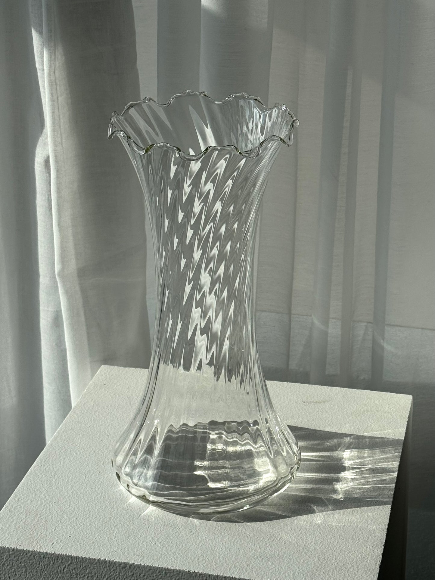 Tall swirling vase
