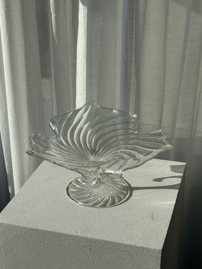 Swirling glass stand