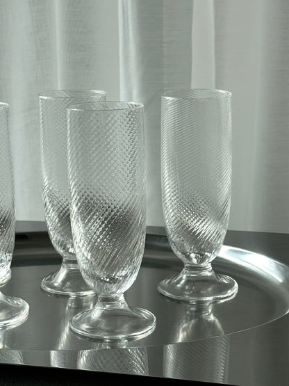 Swirling tall glasses