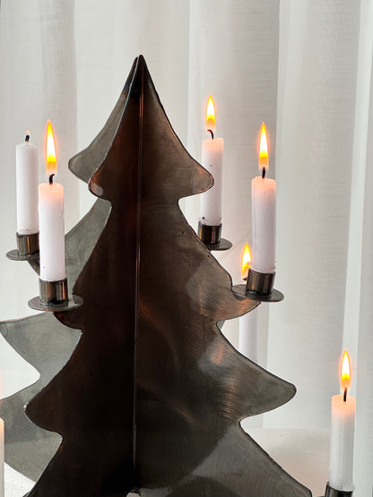 Handmade metal three