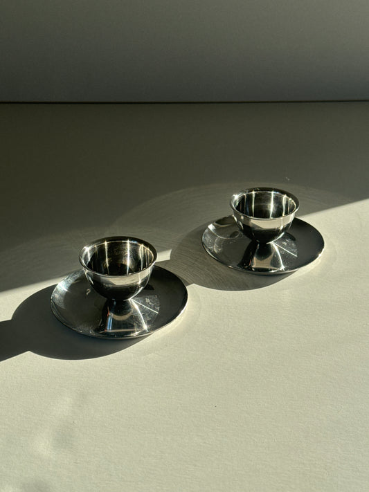 Steel eggcups on foot