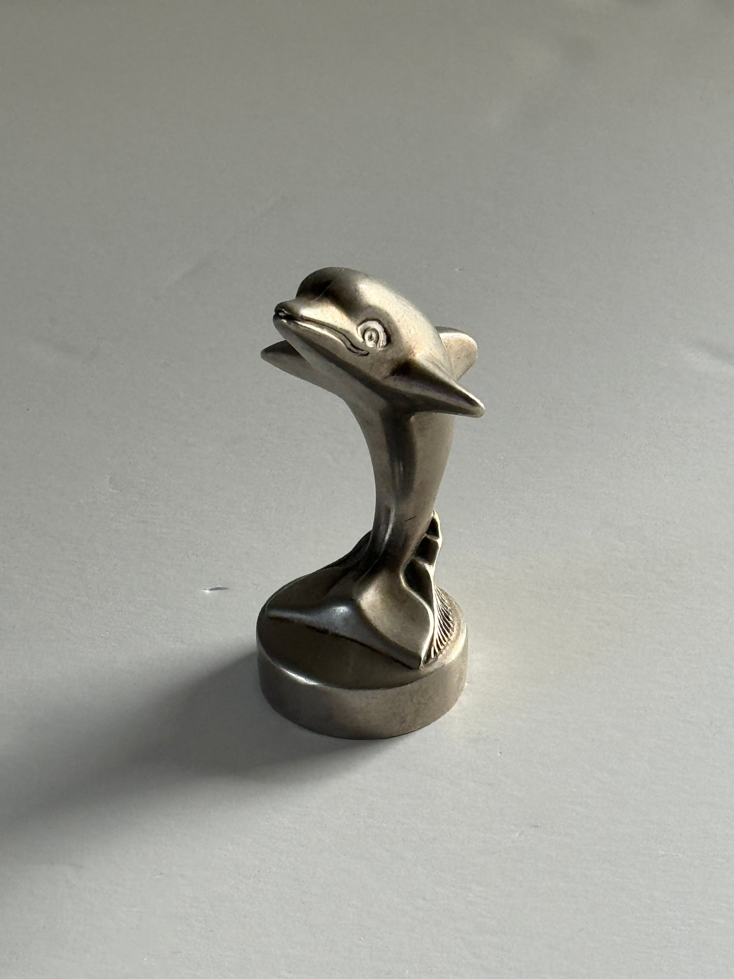 Standing dolphin bottle opener