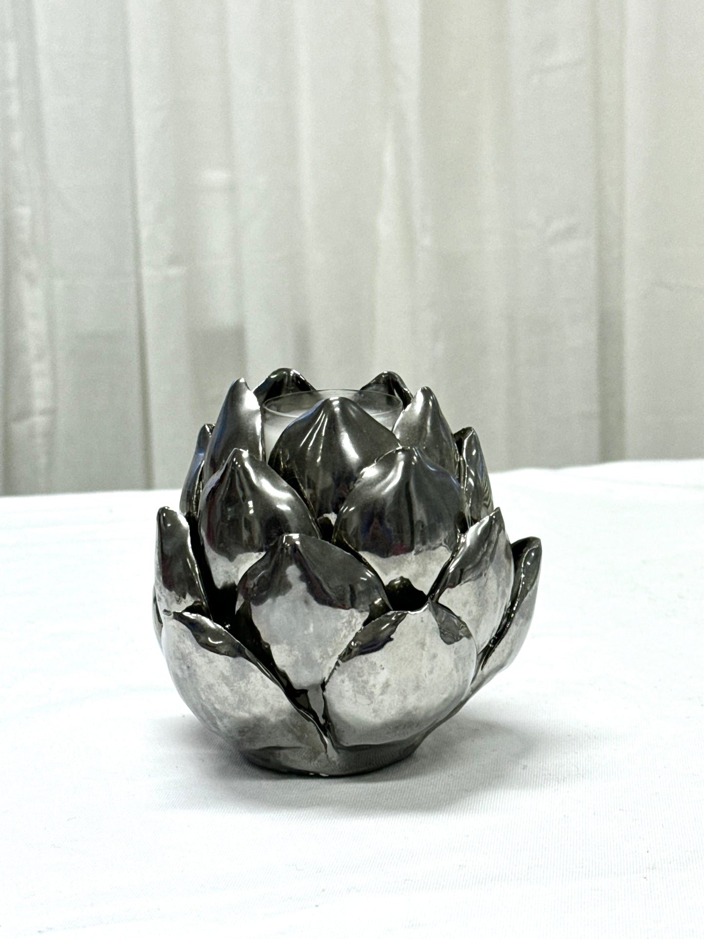 Steel candleholder